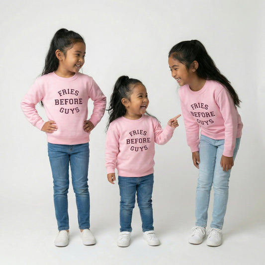 Pink Fries Before Guys sweatshirt for girls styled with jeans three sisters