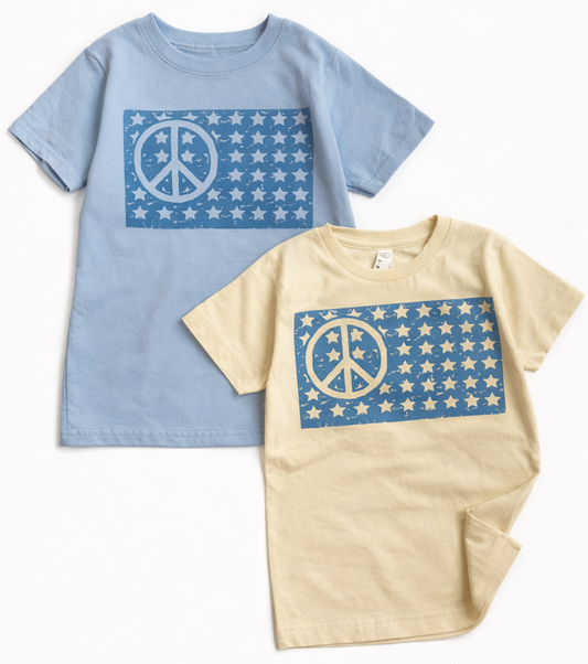Kids graphic T-shirt featuring an American peace flag design by The Wishing Elephant, perfect for 4th of July celebrations.