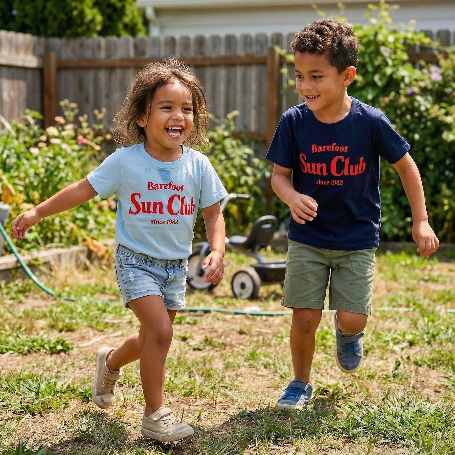 Kids graphic T-shirt from Barefoot Sun Club by The Wishing Elephant, featuring colorful summer design for children.