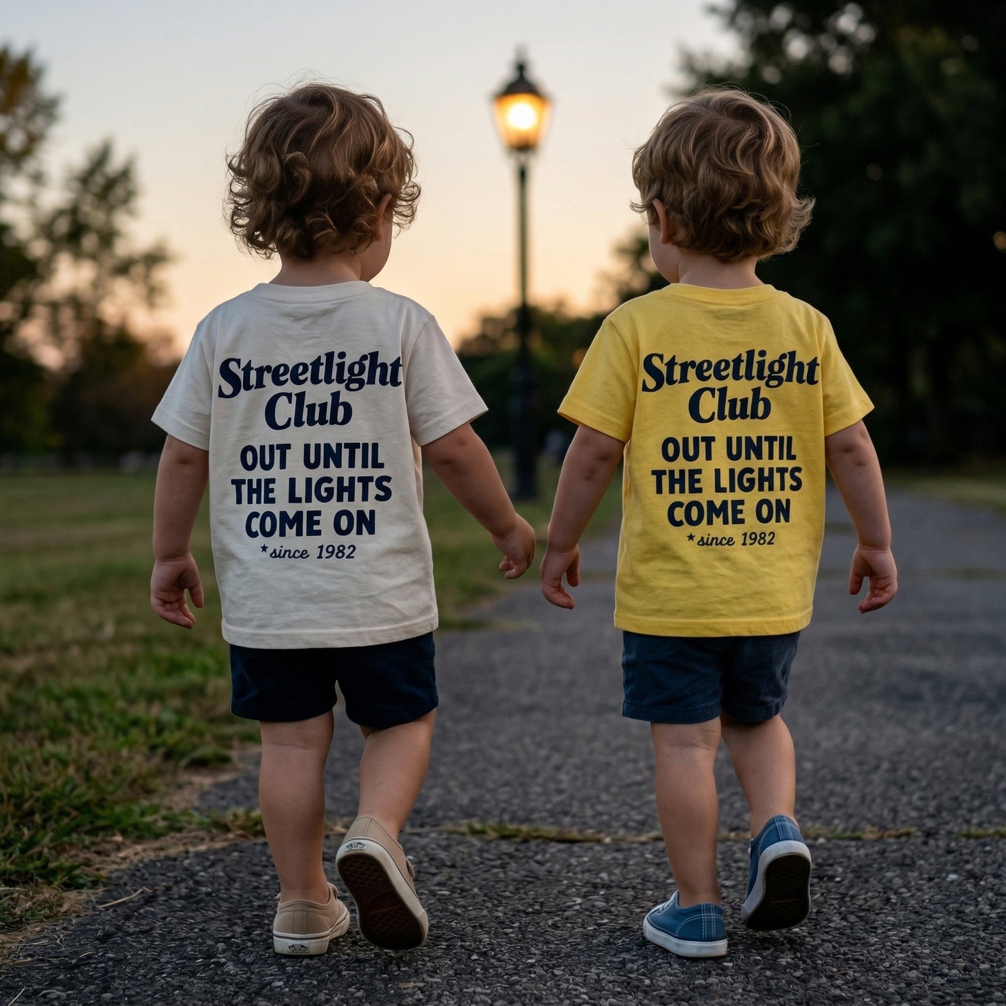 Kids graphic T-shirt featuring a streetlight club design by The Wishing Elephant, perfect for summer style.