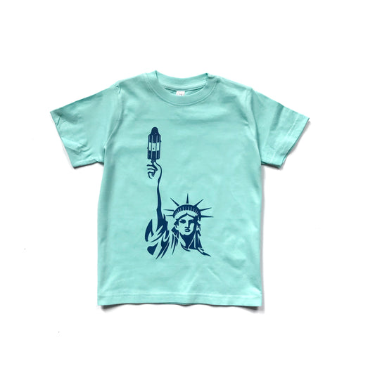 The Wishing Elephant tee featuring a colorful popsicle statue graphic on soft fabric, casual and stylish for everyday wear.